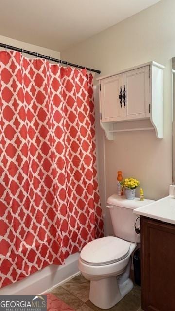 2080 Belmont Cir, Conyers, GA 30012 - full bath featuring vanity, toilet, and tile patterned flooring