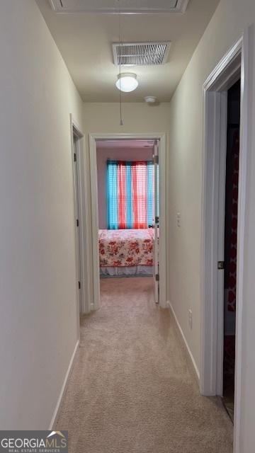2080 Belmont Cir, Conyers, GA 30012 - hall featuring attic access, light carpet, and baseboards
