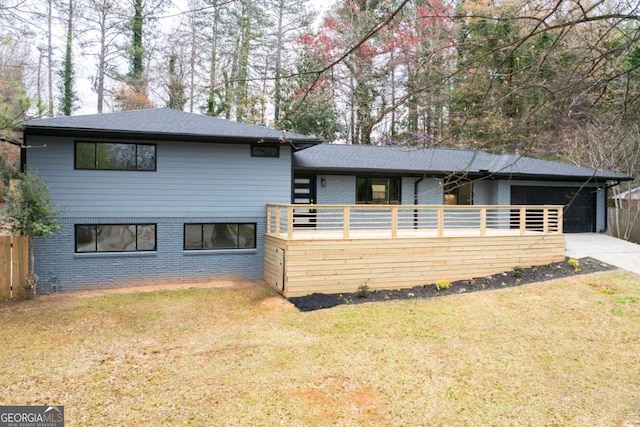 1120 Taliwa Trl NE, Marietta, GA 30068 - view of front of home featuring brick siding, a front yard, driveway, and a shingled roof