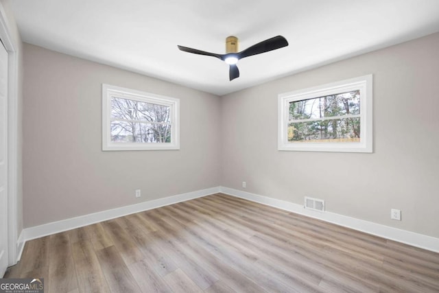 1120 Taliwa Trl NE, Marietta, GA 30068 - empty room with ceiling fan and wood finished floors