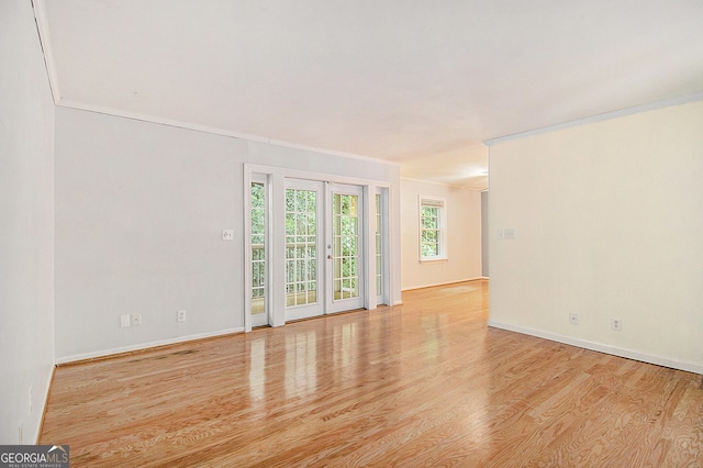 1445 Monroe Dr NE Unit F10, Atlanta, GA 30324 - unfurnished room with crown molding and wood finished floors