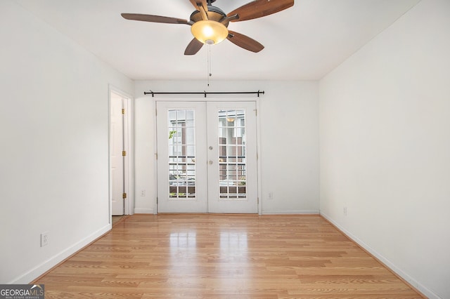 1445 Monroe Dr NE Unit F10, Atlanta, GA 30324 - unfurnished room featuring french doors, light wood-type flooring, and ceiling fan