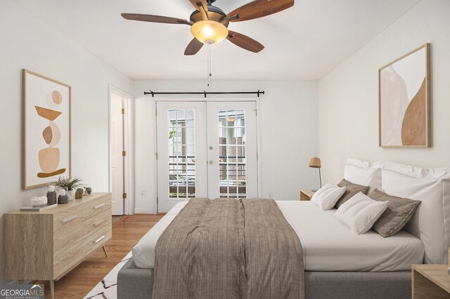 1445 Monroe Dr NE Unit F10, Atlanta, GA 30324 - bedroom featuring access to exterior, wood finished floors, french doors, and ceiling fan