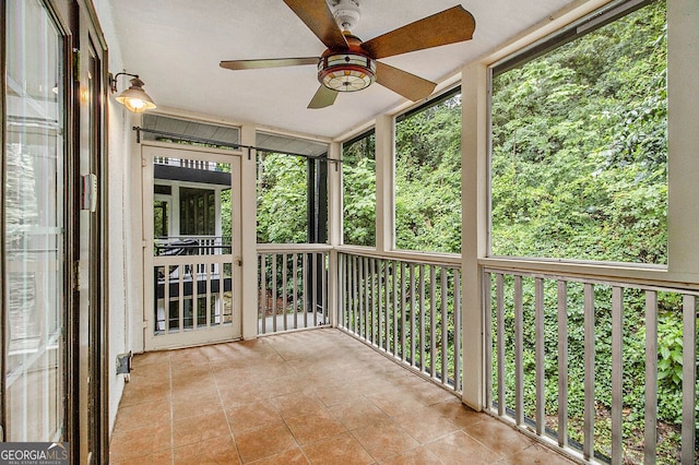 1445 Monroe Dr NE Unit F10, Atlanta, GA 30324 - unfurnished sunroom featuring a ceiling fan
