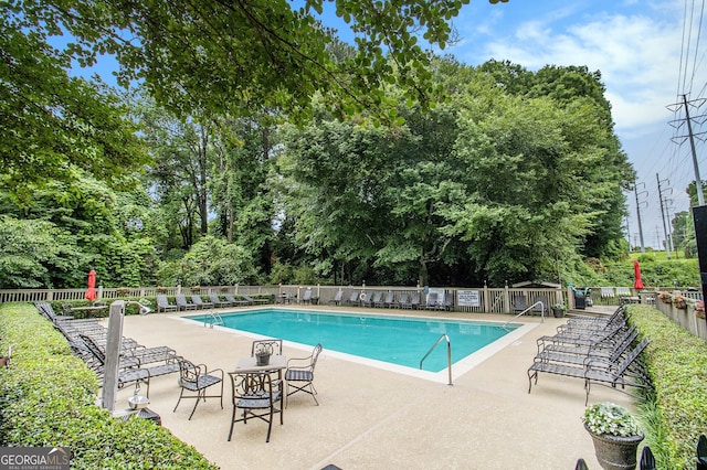 1445 Monroe Dr NE Unit F10, Atlanta, GA 30324 - community pool with a patio