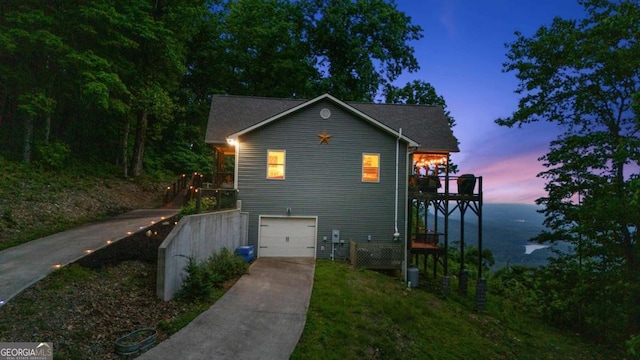 191 Rimrock Rd Unit 63, Jasper, GA 30143 - view of front of home featuring driveway, an attached garage, and a water view