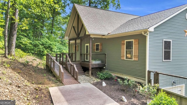 191 Rimrock Rd Unit 63, Jasper, GA 30143 - view of front of home featuring a shingled roof and a wooden deck