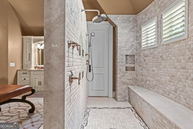 1031 Sugar Run, Greensboro, GA 30642 - bathroom featuring vaulted ceiling, tile patterned flooring, and vanity