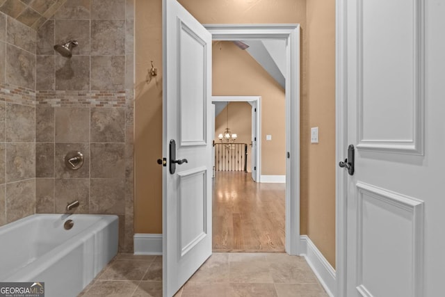 1031 Sugar Run, Greensboro, GA 30642 - full bathroom featuring tub / shower combination and a chandelier