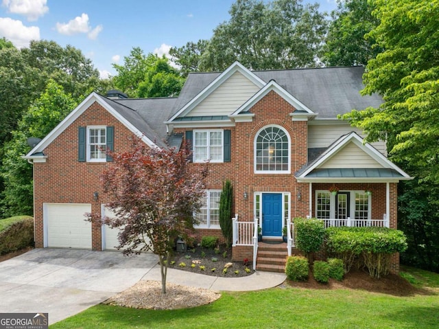 117 Willow View Ln, Canton, GA 30114 - view of front of home with concrete driveway, an attached garage, brick siding, and a front yard