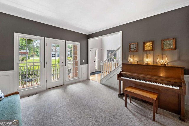 117 Willow View Ln, Canton, GA 30114 - living area featuring a wainscoted wall, plenty of natural light, ornamental molding, french doors, and a decorative wall