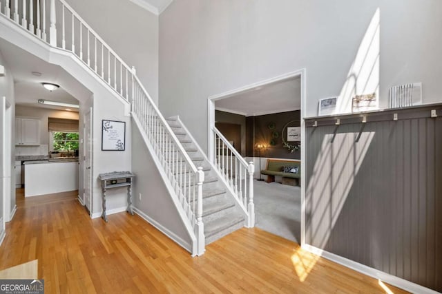 117 Willow View Ln, Canton, GA 30114 - stairs with wood finished floors and a towering ceiling