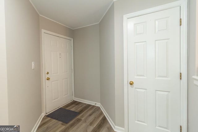 1017 Ridgefield Dr, Peachtree City, GA 30269 - doorway featuring light wood-style floors, ornamental molding, and baseboards