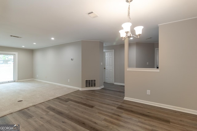 1017 Ridgefield Dr, Peachtree City, GA 30269 - spare room with wood finished floors, recessed lighting, baseboards, and a chandelier