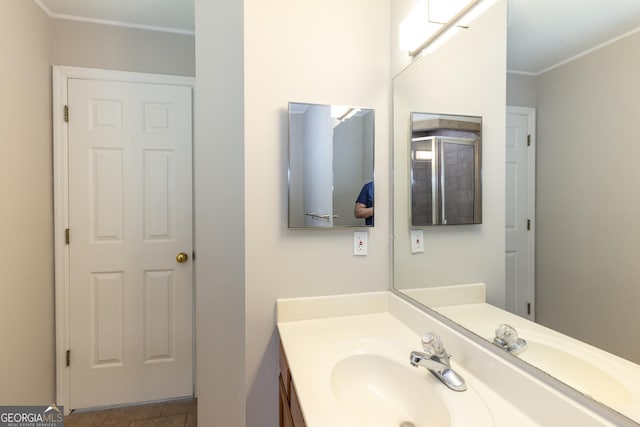 1017 Ridgefield Dr, Peachtree City, GA 30269 - bathroom with vanity, ornamental molding, and tile patterned floors