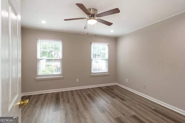 1017 Ridgefield Dr, Peachtree City, GA 30269 - empty room with wood finished floors, baseboards, ceiling fan, recessed lighting, and ornamental molding