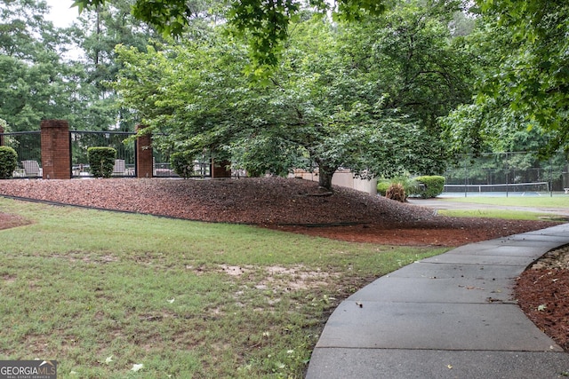 1017 Ridgefield Dr, Peachtree City, GA 30269 - view of yard with a tennis court