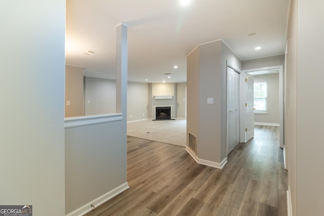 1017 Ridgefield Dr, Peachtree City, GA 30269 - hallway with wood finished floors, baseboards, and recessed lighting