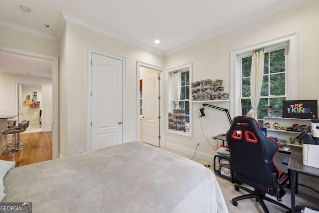 3280 Stillhouse Ln SE Unit 212, Atlanta, GA 30339 - bedroom with ornamental molding, a desk, recessed lighting, and wood finished floors