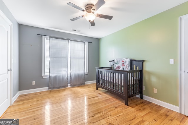 23 Raleigh Dr, Lafayette, GA 30728 - bedroom featuring multiple windows, hardwood / wood-style floors, and baseboards