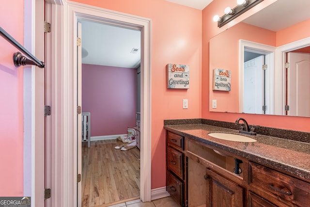 23 Raleigh Dr, Lafayette, GA 30728 - bathroom featuring vanity, baseboards, and wood finished floors