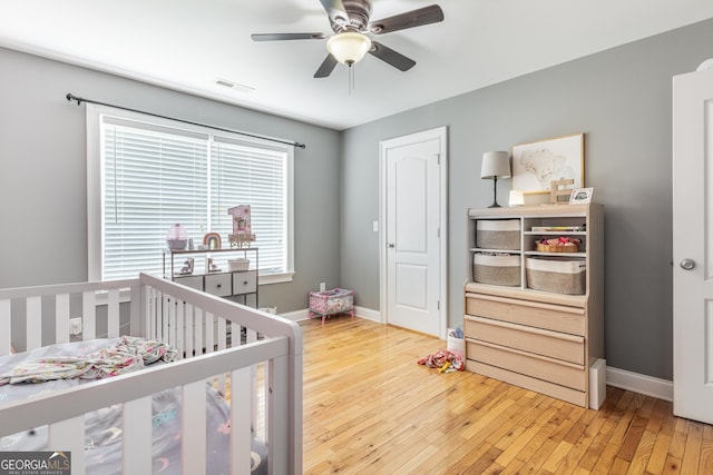 23 Raleigh Dr, Lafayette, GA 30728 - bedroom featuring light wood-type flooring, a nursery area, and baseboards