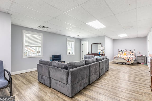 23 Raleigh Dr, Lafayette, GA 30728 - living room with a drop ceiling, wood finished floors, and baseboards