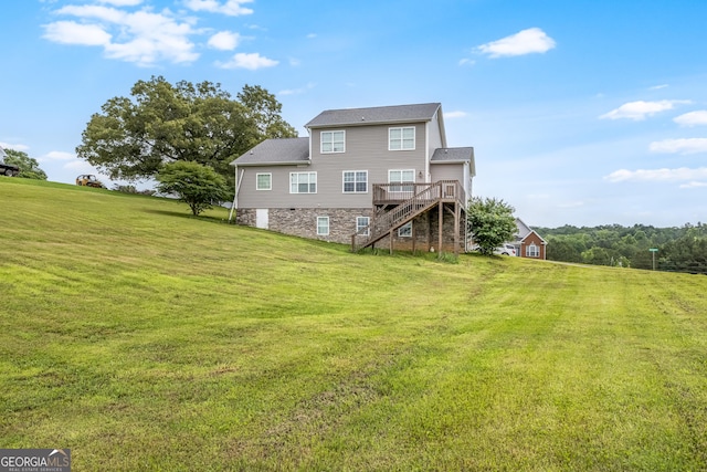 23 Raleigh Dr, Lafayette, GA 30728 - back of house featuring stairs, a deck, and a lawn