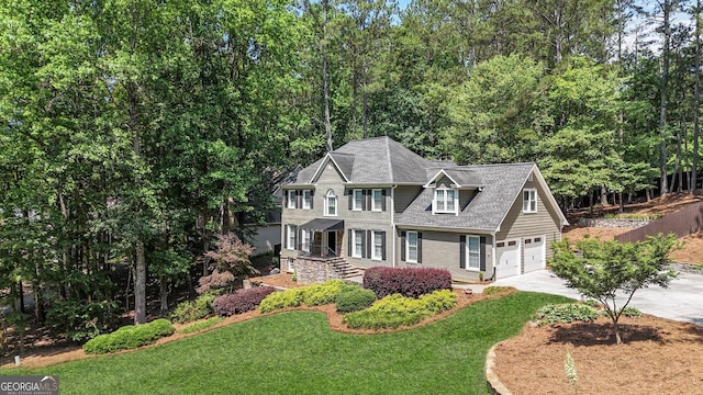 4320 Oklahoma Way NW, Kennesaw, GA 30152 - colonial inspired home with driveway and a garage