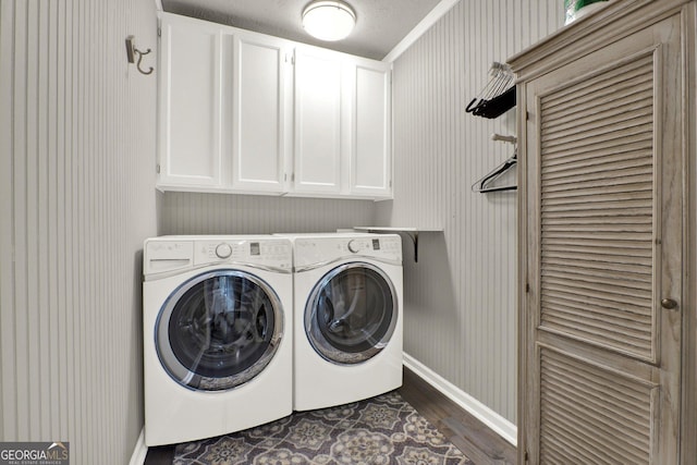 4320 Oklahoma Way NW, Kennesaw, GA 30152 - washroom featuring cabinet space, washing machine and clothes dryer, dark wood finished floors, and baseboards