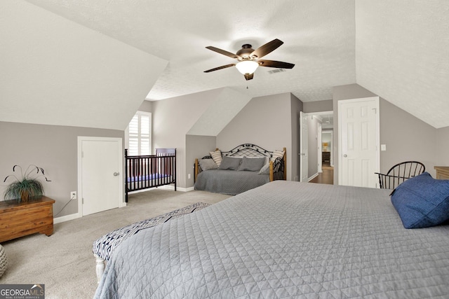 4320 Oklahoma Way NW, Kennesaw, GA 30152 - bedroom featuring lofted ceiling, carpet flooring, baseboards, a textured ceiling, and ceiling fan