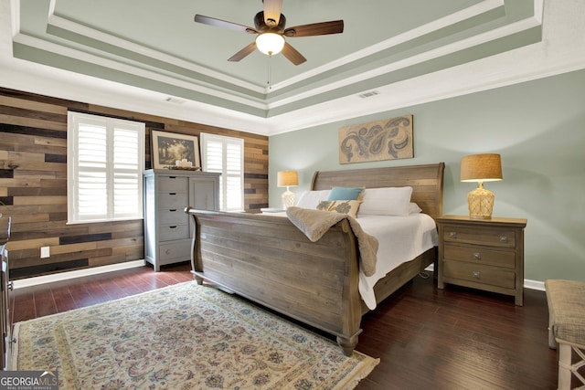 4320 Oklahoma Way NW, Kennesaw, GA 30152 - bedroom with a tray ceiling, crown molding, wood finished floors, wooden walls, and ceiling fan