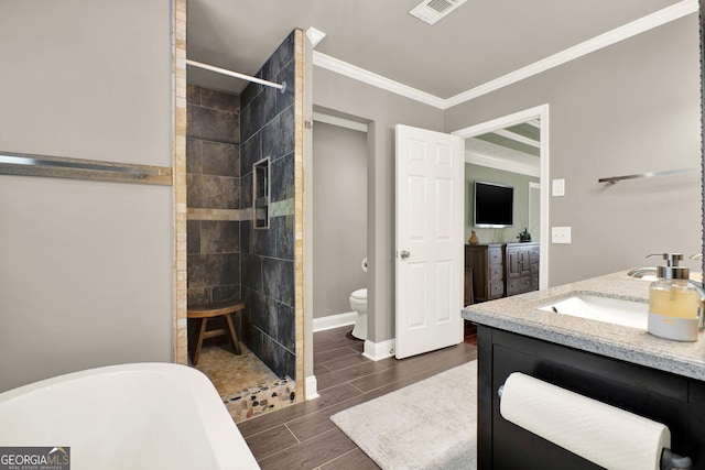 4320 Oklahoma Way NW, Kennesaw, GA 30152 - full bath featuring vanity, a freestanding bath, crown molding, tiled shower, and wood finish floors