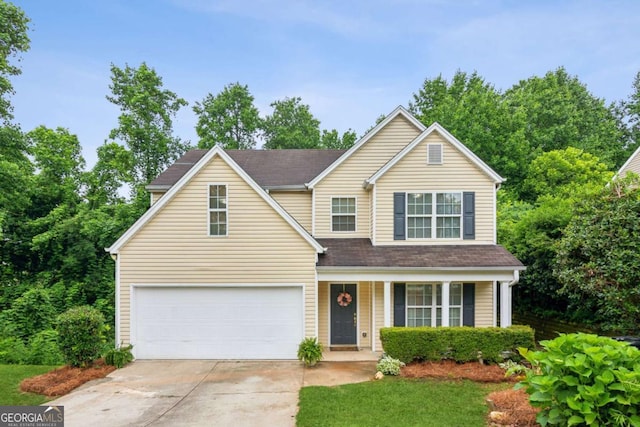 2112 Catalina Dr, Gainesville, GA 30504 - traditional home featuring driveway, an attached garage, and covered porch