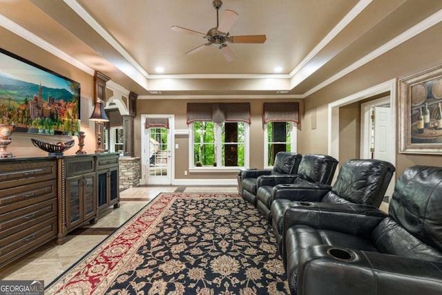 8970 Moor Park Run, Duluth, GA 30097 - living room with a tray ceiling, ornamental molding, ceiling fan, and ornate columns