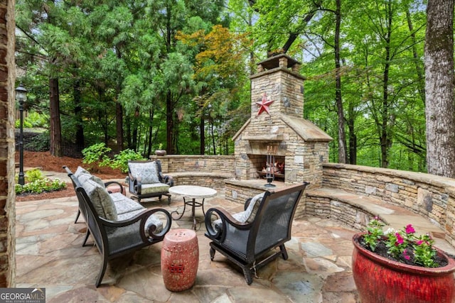 8970 Moor Park Run, Duluth, GA 30097 - view of patio featuring an outdoor stone fireplace