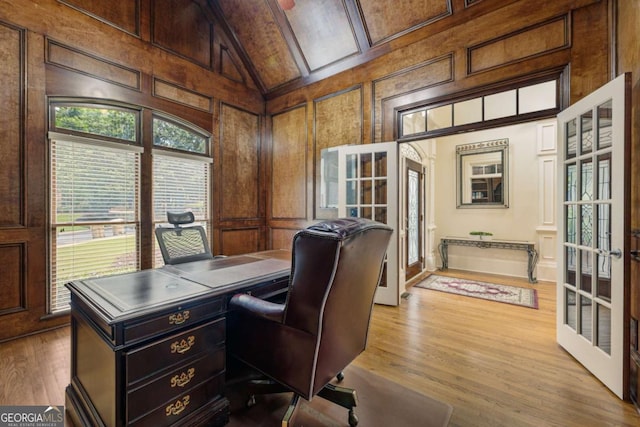 8970 Moor Park Run, Duluth, GA 30097 - office space with french doors, wood finished floors, a decorative wall, high vaulted ceiling, and beamed ceiling