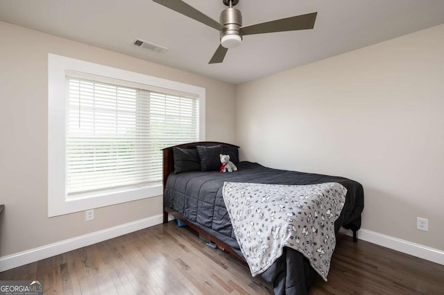 1270 Mccannon Morris Rd, Hull, GA 30646 - bedroom with baseboards, wood finished floors, and ceiling fan