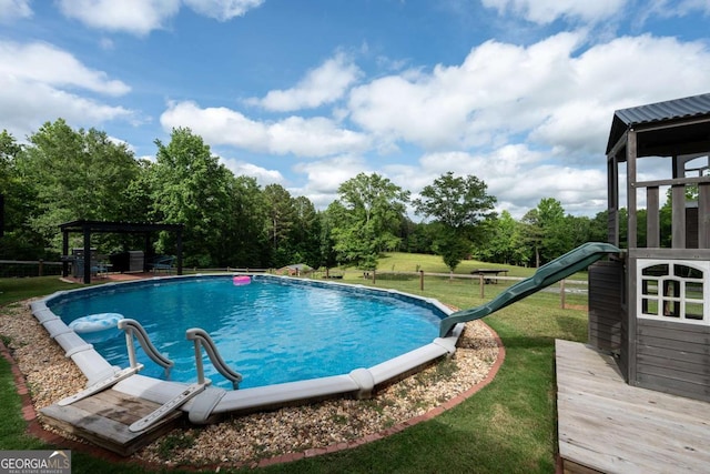 1270 Mccannon Morris Rd, Hull, GA 30646 - swimming pool with a yard, a water slide, a gazebo, and view of scattered trees