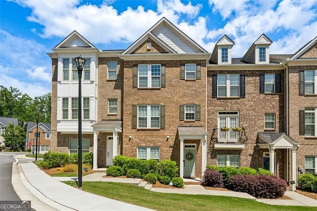 1174 City Park Ln, Decatur, GA 30033 - townhome / multi-family property featuring brick siding