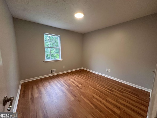 80 Brooks Ln, Dallas, GA 30157 - unfurnished room featuring wood finished floors and baseboards