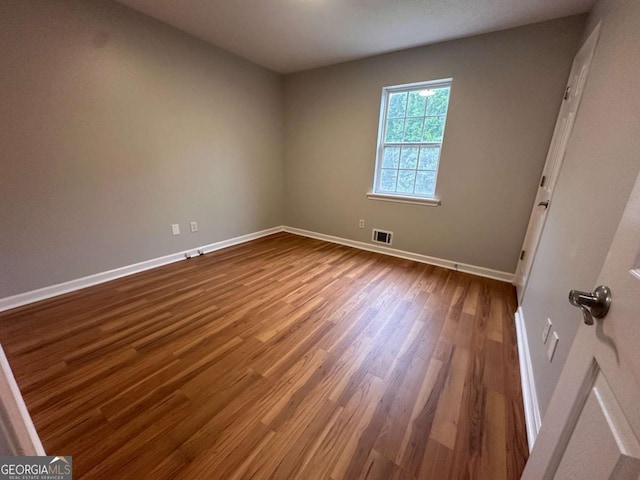 80 Brooks Ln, Dallas, GA 30157 - unfurnished room featuring baseboards and dark wood-style floors