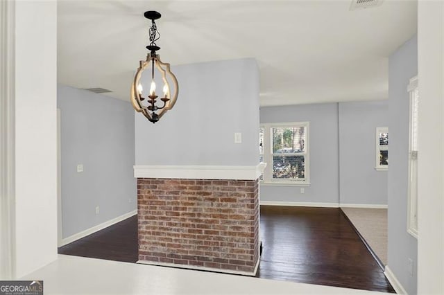 2505 Mellville Ave, Decatur, GA 30032 - entrance foyer featuring wood finished floors, a chandelier, and baseboards