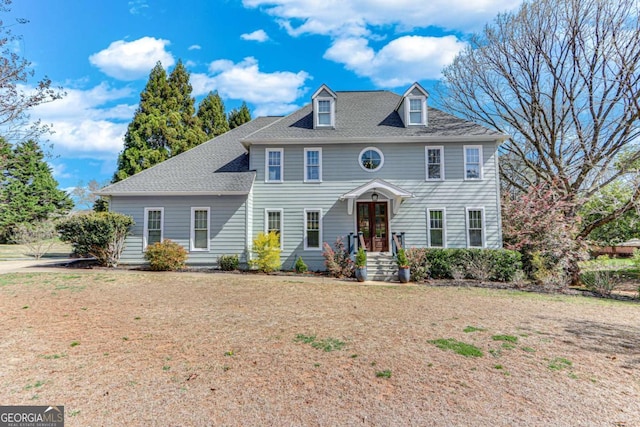 4402 Sugar Maple Pl, Gainesville, GA 30506 - colonial inspired home featuring a front yard and roof with shingles