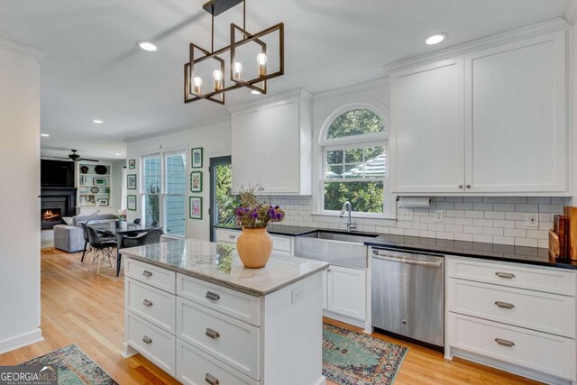 4402 Sugar Maple Pl, Gainesville, GA 30506 - kitchen with stainless steel appliances, white cabinets, open floor plan, light wood-type flooring, and recessed lighting