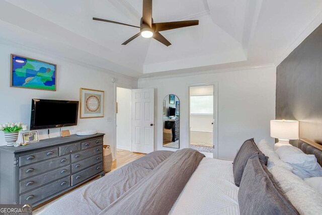 4402 Sugar Maple Pl, Gainesville, GA 30506 - bedroom featuring a tray ceiling, light wood-style floors, a ceiling fan, and baseboards