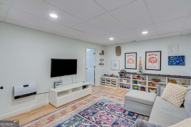 4402 Sugar Maple Pl, Gainesville, GA 30506 - bedroom with a raised ceiling, connected bathroom, and ceiling fan