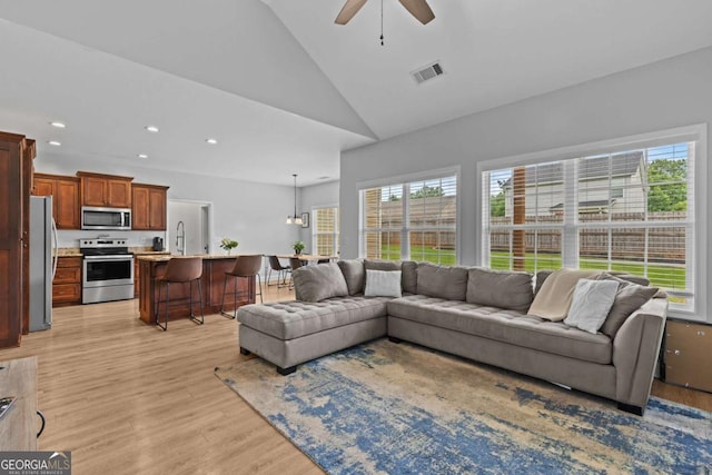 419 Highland Pointe Dr, Alto, GA 30510 - living room with a ceiling fan, light wood finished floors, recessed lighting, and high vaulted ceiling