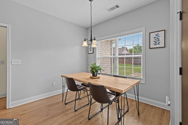419 Highland Pointe Dr, Alto, GA 30510 - dining room featuring light wood-style flooring and a chandelier