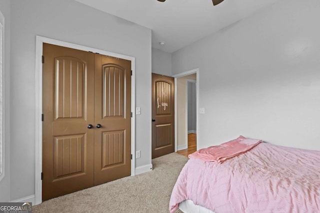 419 Highland Pointe Dr, Alto, GA 30510 - bedroom featuring carpet floors, a closet, and a ceiling fan